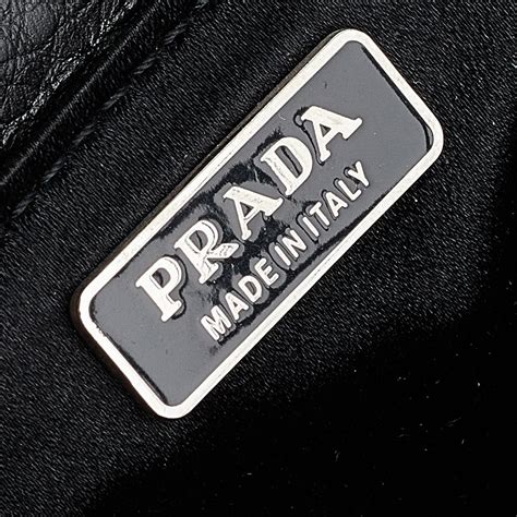 prada bag metal handle|Prada bags selfridges.